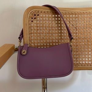 Small coach “swinger” bag. Purple/lilac color